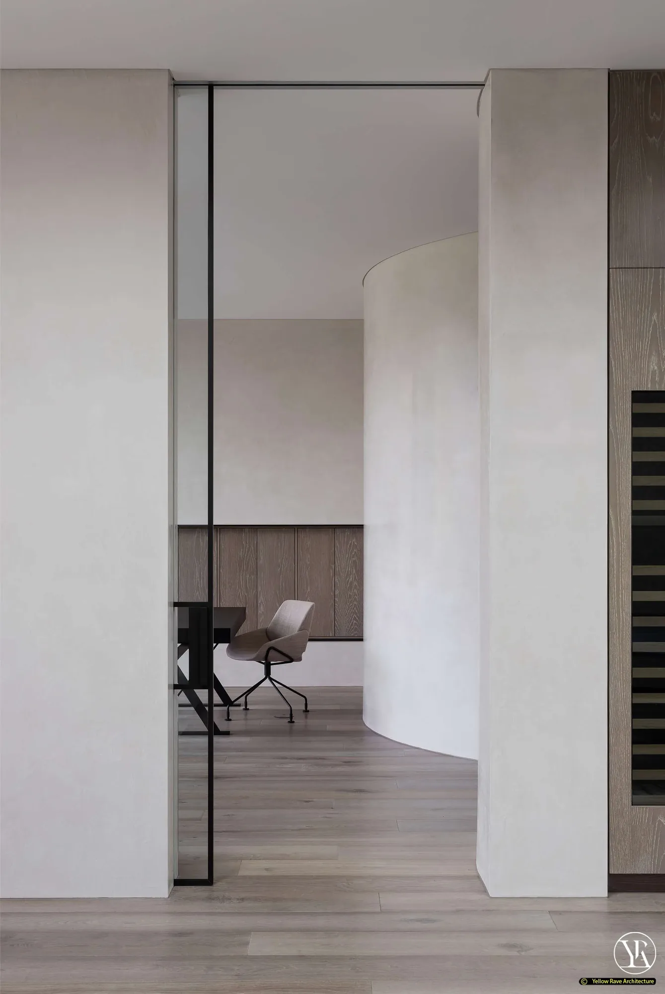 House of Privacy Walls — master bathroom with marble-clad built-in tub, grey marble tile walls and full-height glazing with sheer curtains