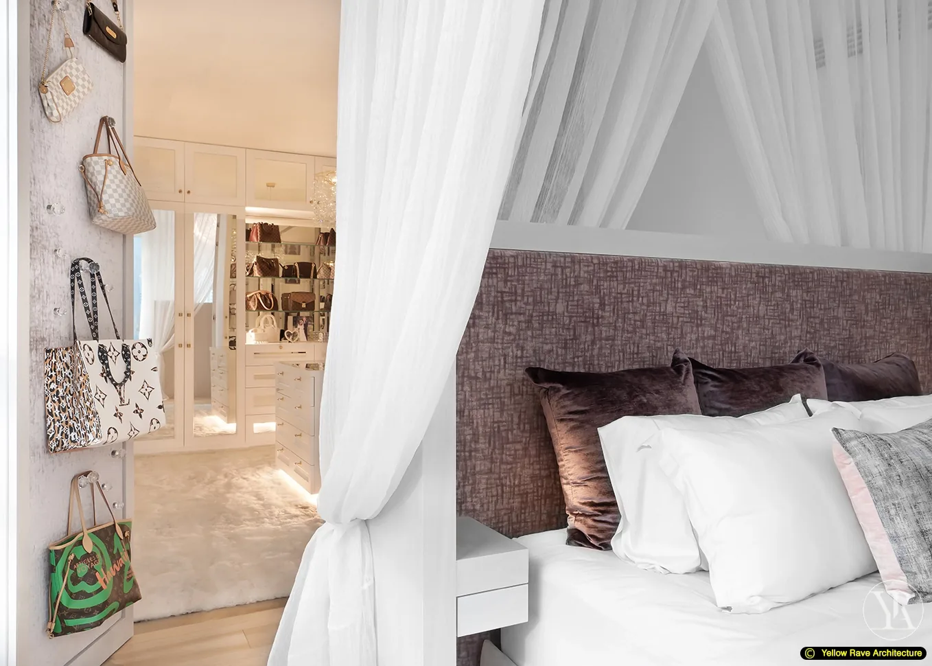 Show-Piece Wardrobe — master bedroom beyond the wardrobe showing canopied four-poster bed with sheer white drapes and textured upholstered headboard