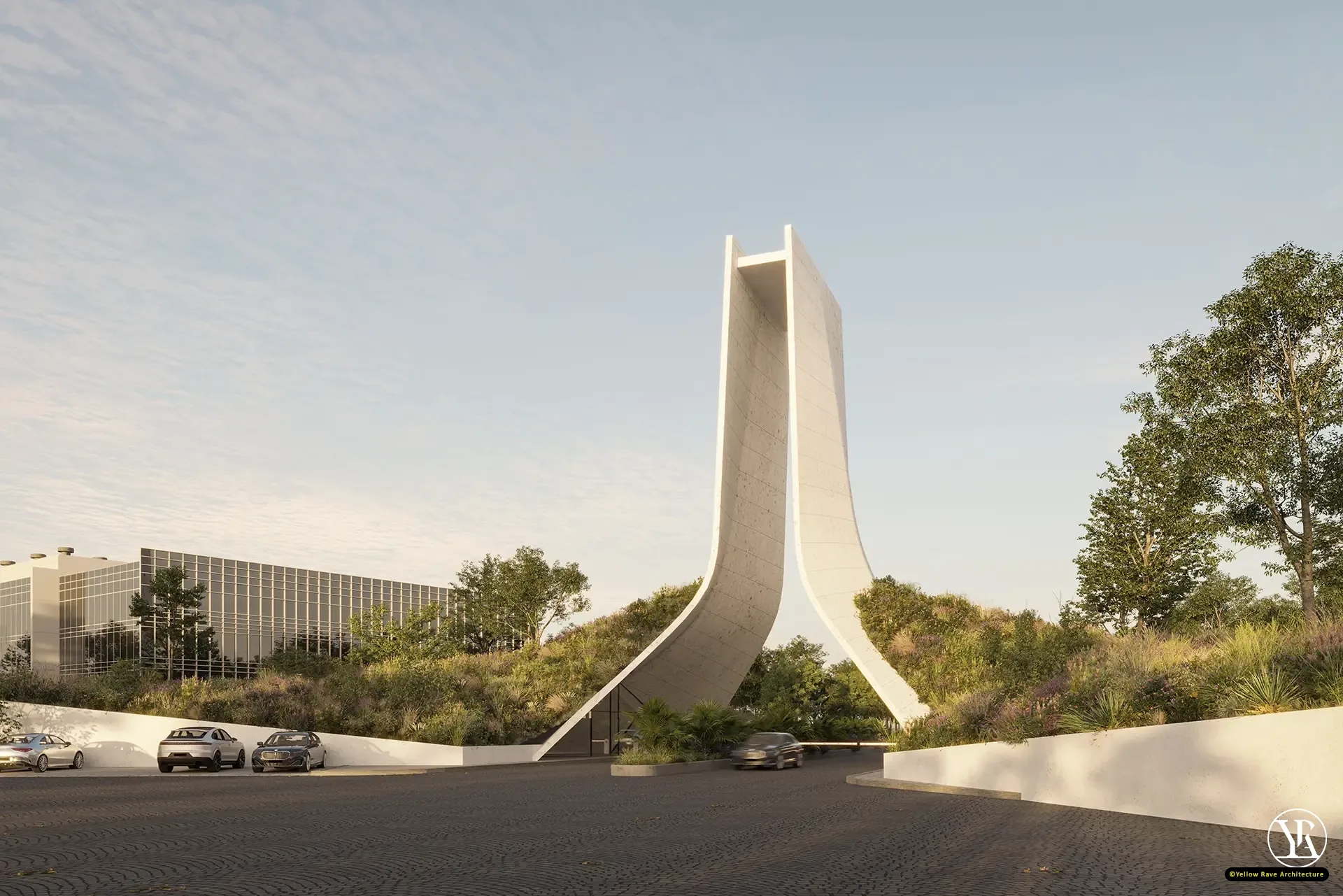 Monumental Gate — aerial view showing the gate in context with flanking landscaped berms, access road passing beneath and surrounding development, concept render
