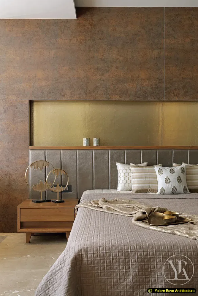 Earth Tone — second living area with grey fabric sectional sofa, yellow chevron shaggy rug and floating timber art shelf