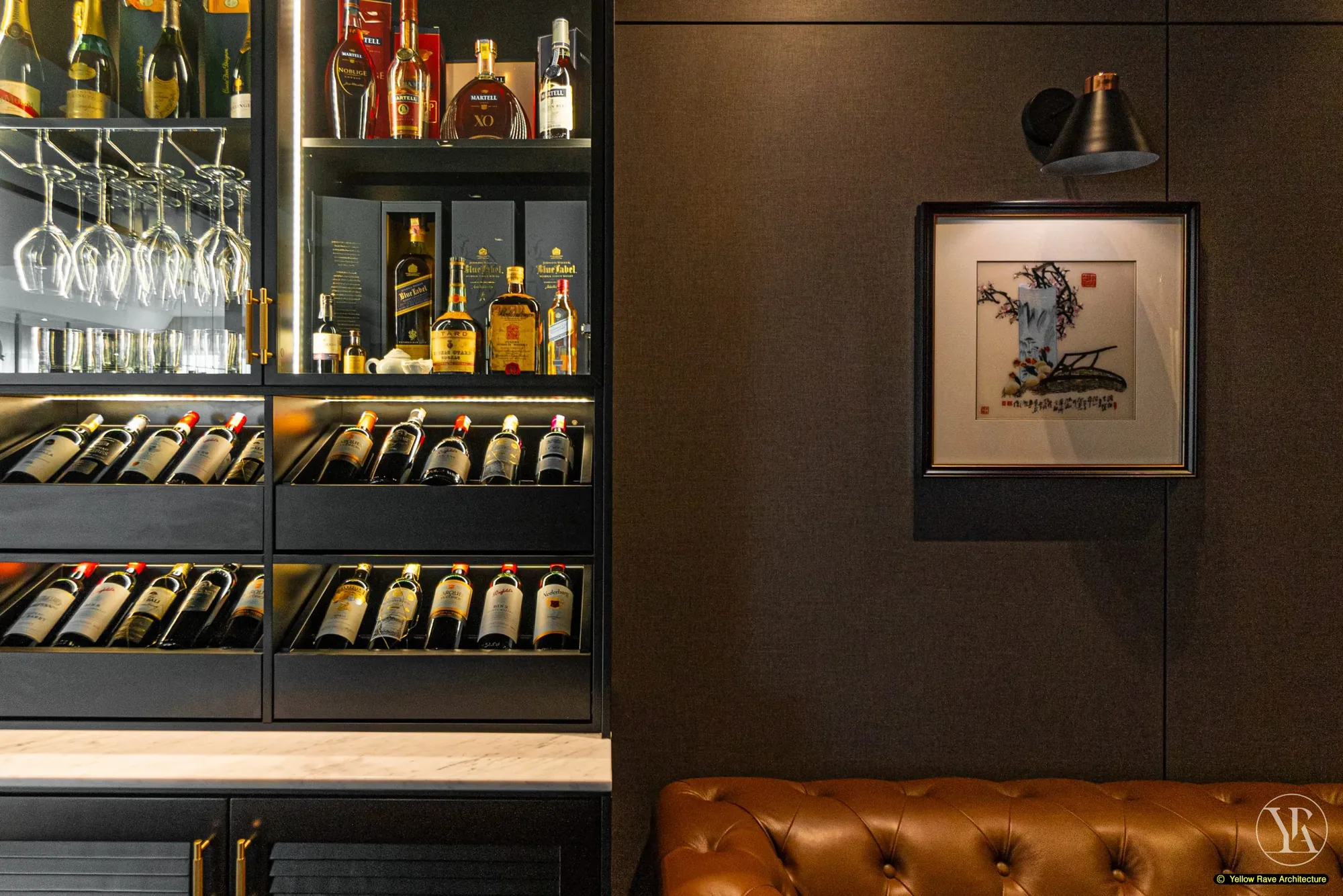 Down Time Drinks — side view of full bar cabinet, Chesterfield sofa and Asian ink painting on dark wall