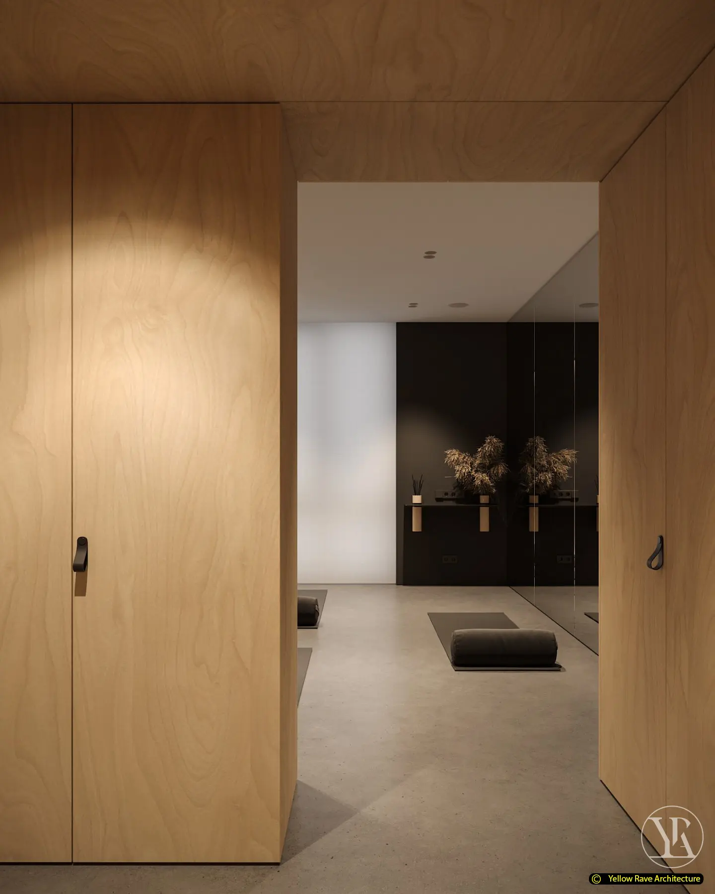 Yoga with Friends — close-up of birch plywood wall panel, built-in dark storage niche with recessed shelves and black rubber accessory hooks