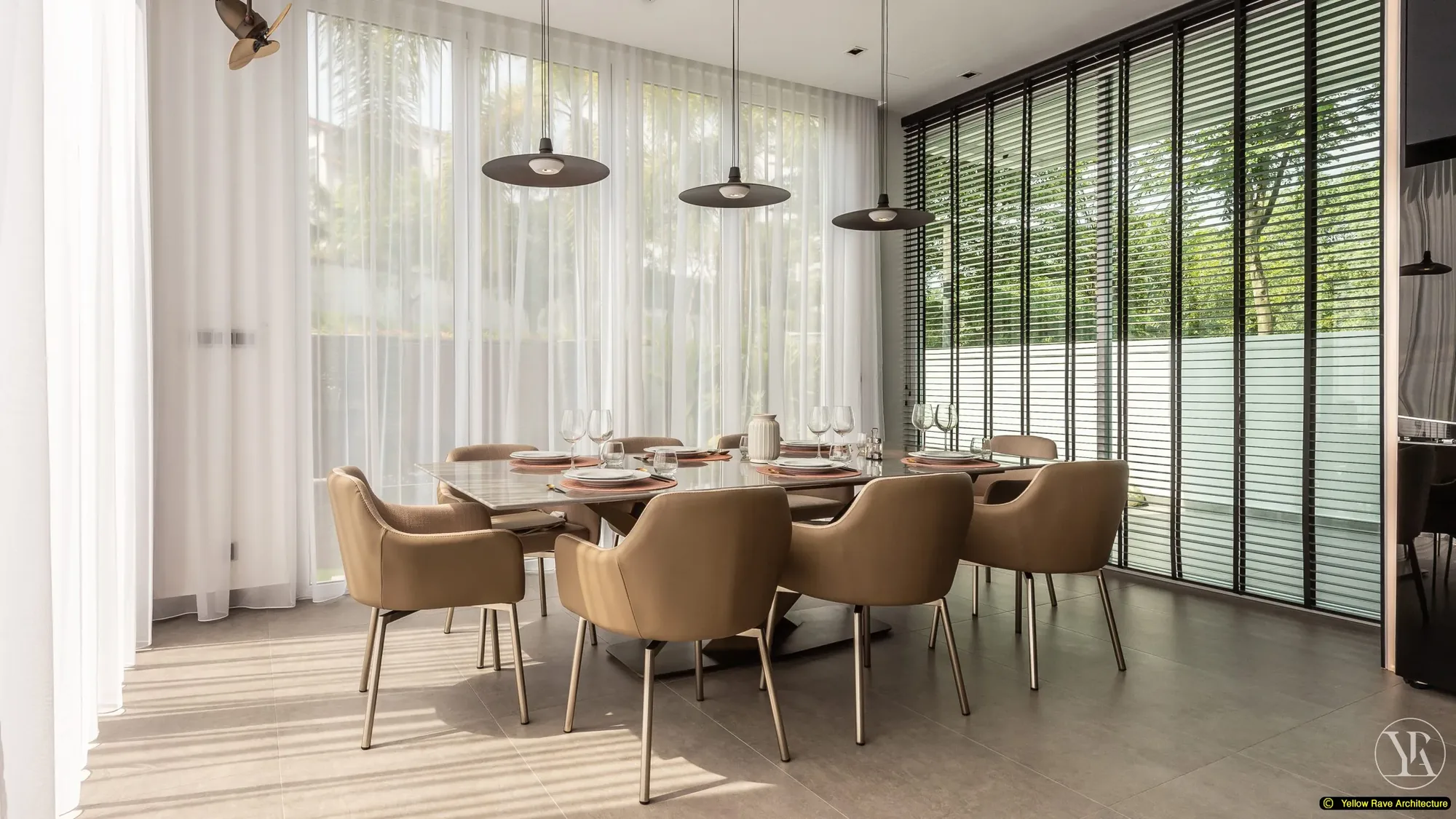 Soft Mirrored Kitchen — side view showing kitchen with navy cabinets, bronze-framed glass uppers, breakfast bar, louvred window blinds and adjacent dining area with pendant lights