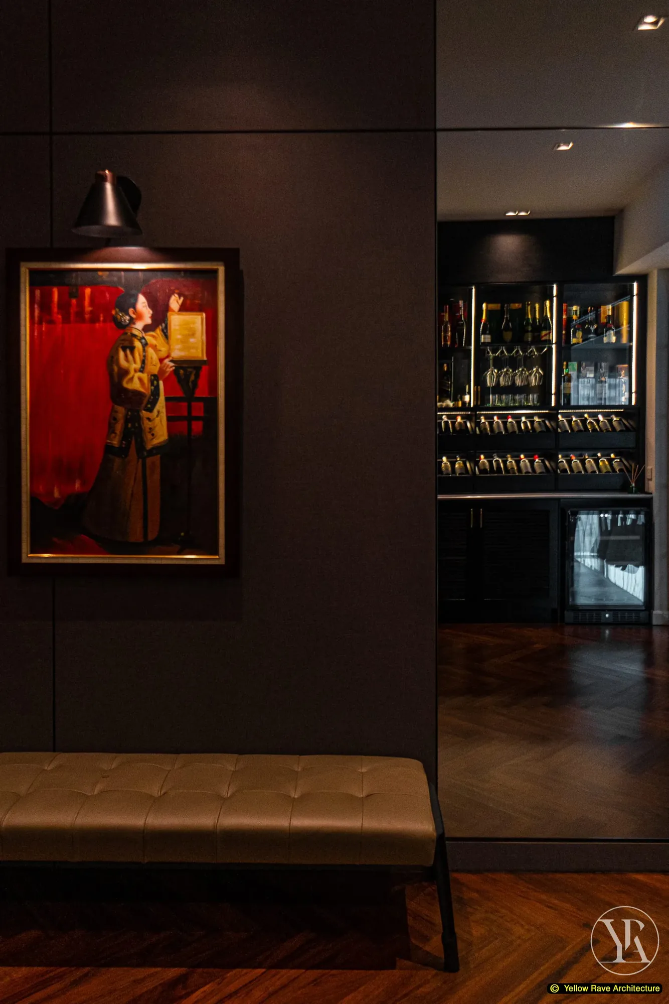 Down Time Drinks — bar cabinet detail showing champagne and spirits on top shelf, suspended wine glasses and wine rack slots below