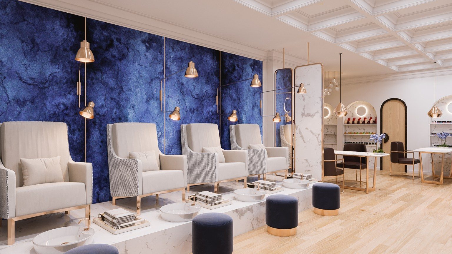 Lueur Salon — detail of gold-embossed LUEUR logo on cobalt velvet feature wall
