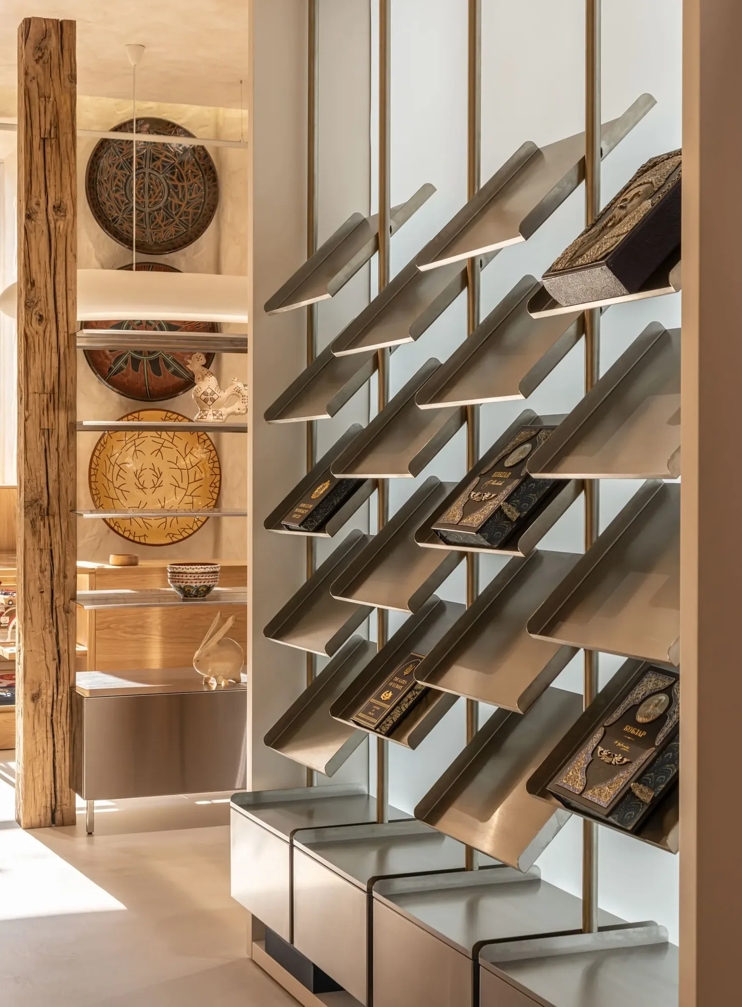 Miko Heritage Boutique — entry view with lime-rendered walls, reclaimed columns and straw ceiling overhead